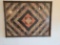 Quilt in frame, log cabin