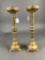 Pair of tall brass candlesticks