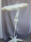Standing lighted magnifying glass