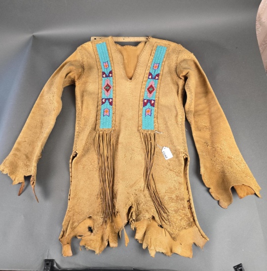 Leather shirt with (2) beaded strips