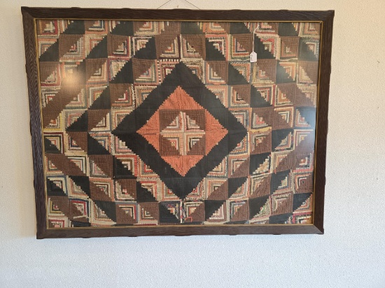 Quilt in frame, log cabin