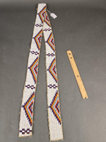 Pair of beaded mens legging stips, beaded on hide
