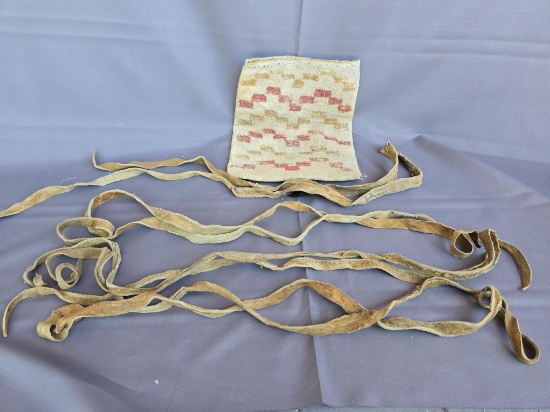 Old yarn bag with 4 old hide ropes