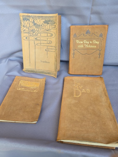 4 leather bound books