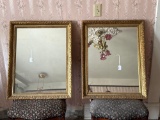 Matching pair of mirrors in antique gold leaf frames