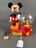 Mickey Mouse wrist watch and newer gum-ball machine