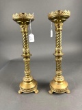 Pair of tall brass candlesticks