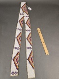 Pair of beaded mens legging stips, beaded on hide