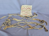 Old yarn bag with 4 old hide ropes