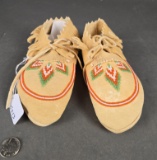 Buckskin moccasins with beaded geometric design