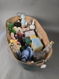 Vintage tin child's washtub with many vintage Avon bottles