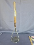 Huge potato masher used on wannigan