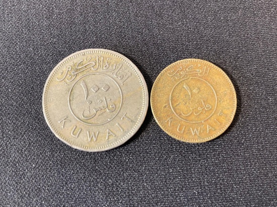 Kuwaiti Fils coins. The larger coin is a 100 Fils coin, and the smaller coin is a 10 Fils coin