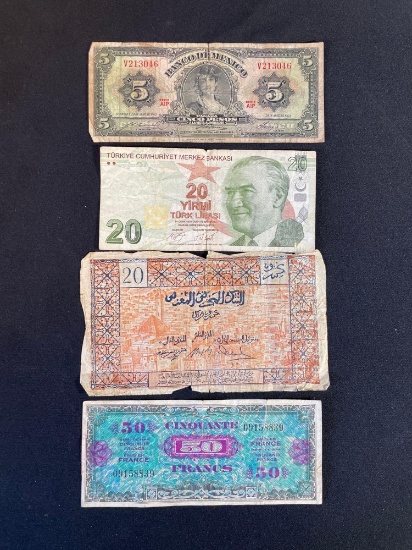 collection of banknotes from different countries and eras