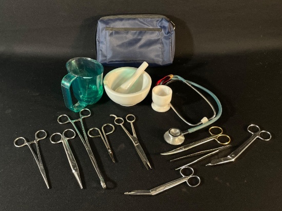 medical/nursing student training kit containing various assessment tools, surgical instruments