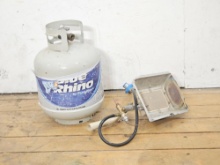 Blue Rhino 15 lb Propane Tank next to a portable propane radiant heater
