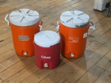 hree vintage insulated water and beverage coolers