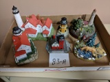 Lighthouse Statues And Deer Scene