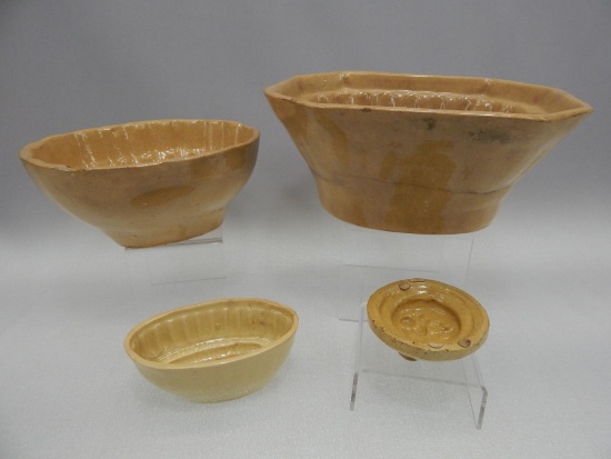 GROUP OF 4 YELLOW WARE MOULDS (SOME DAMAGE)