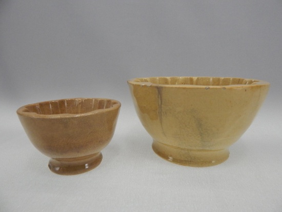 2 YELLOW WARE MOULDS 4" & 6" AS IS