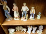 2 shelves of figurines