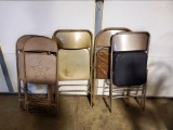 Five folding chairs