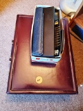 Briefcase, slide rule, Calculators, more