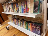 Two Shelves Of VHS Movie Tapes