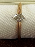 Woman's Solitaire Diamond Ring