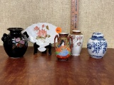 Jars and fan marked Japan