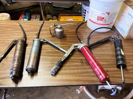 Oil Can and Grease Guns in 5 gallon bucket