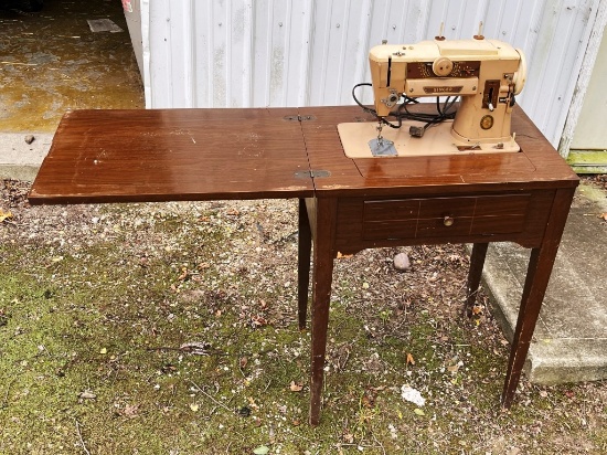Singer Sewing Machine in Cabinet