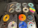 Two Case Logic Folders with CDs