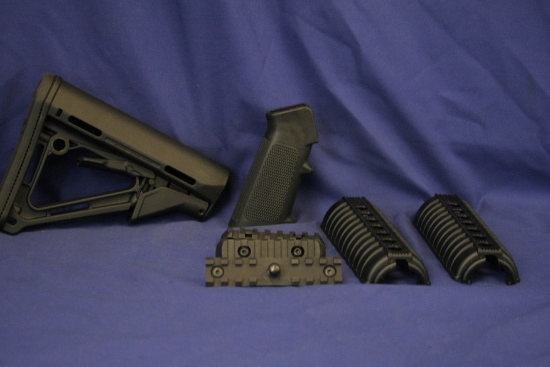 AR-15 grip,handguard, and Magpul collapsible stock.
