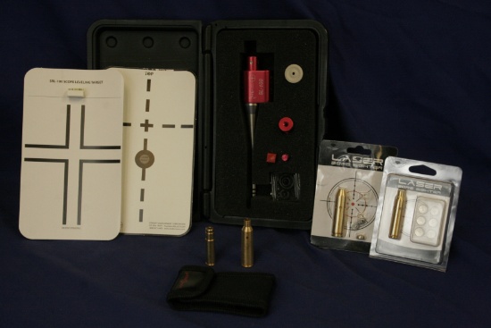 Red Site-Lite laser bore sighter with adapters and o-rings.
