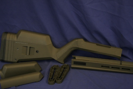 OD green Magpul Hunter stocks for Ruger 10/22 with accessories.