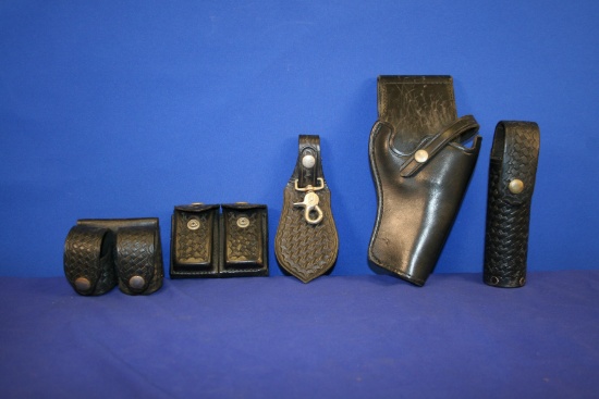 Various Basketweave Duty Belt Accessories and a Plain Gun Holster.