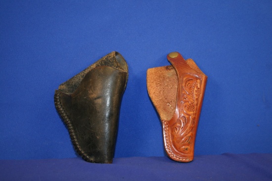 Black Leather Holster and 1 Brown Holster for small frame revolvers.