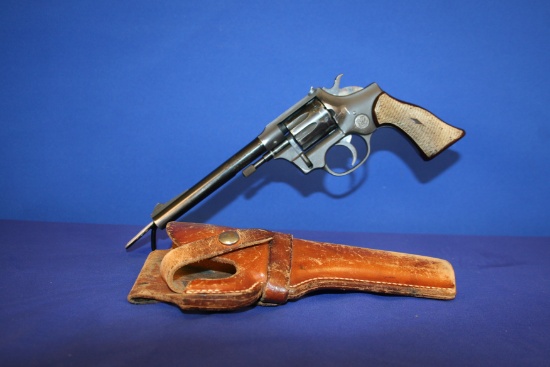 Hi Standard R101 22 cal. 9 Shot Revolver w/Leather Holster. SN: 827803  Not CA OK. C&R