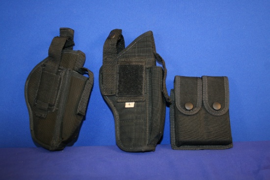 Two Misc Black Nylon Handgun Holsters and One Double Mag Pouch.