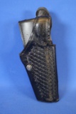 Safariland Level III Mid-Ride Holster.
