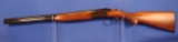 Savage model 330, Over and Under Shotgun. SN#32213V. In Good Condition.