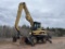 Caterpillar M325b Material Handler