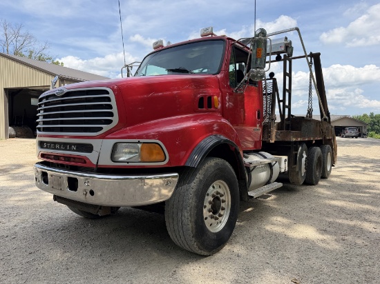Sterling Quad Axle Roll Off Truck