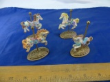 Collectable Figurines 4 Carousel Horses note; 1 slides up and down on pole, not supposed to