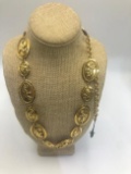 Vintage Chanel gold chain necklace with cherub medals.