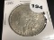 1886 Morgan silver dollar Unc