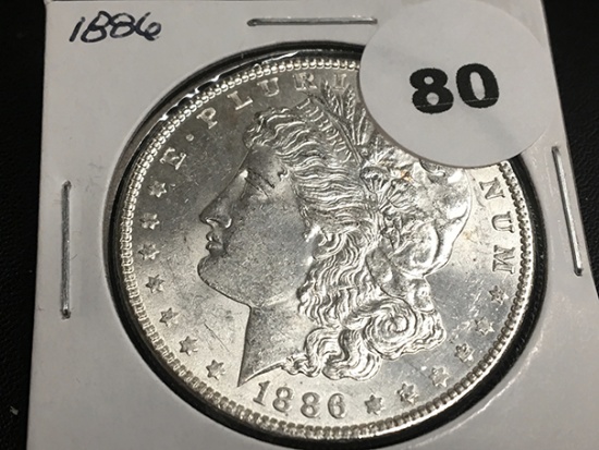 1886 Morgan silver dollar Unc