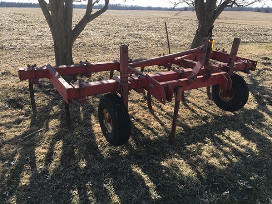 MF 127, 3 pt. 11 shank chissel plow, gauge wheels