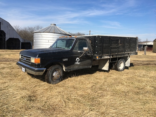1987 Ford F350, gas, 4 spd., dually truck 11 1/2ft bed and hoist steel floor